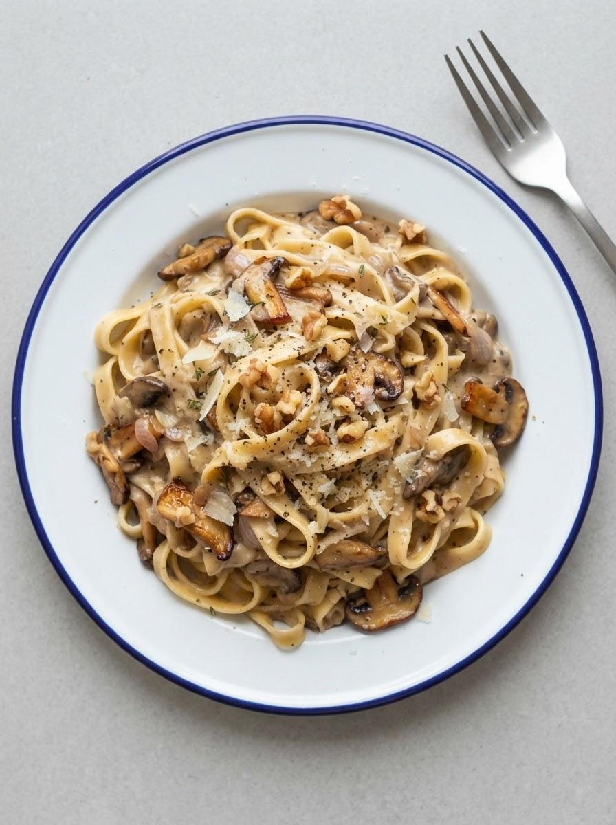 Vegetarische tagliatelle met paddenstoelenroomsaus